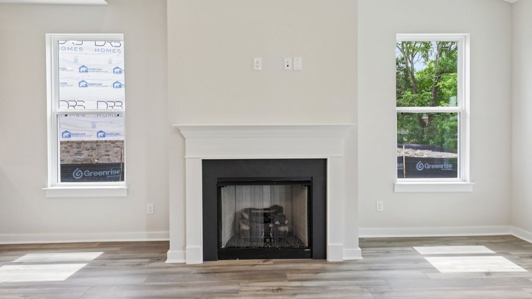 Gathering Room with windows and fireplace