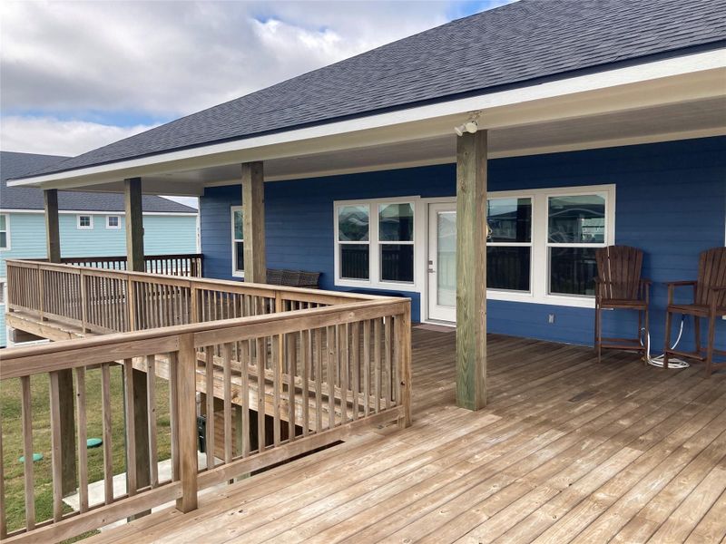 Step onto the 960sf deck looking onto the Gulf just steps away.