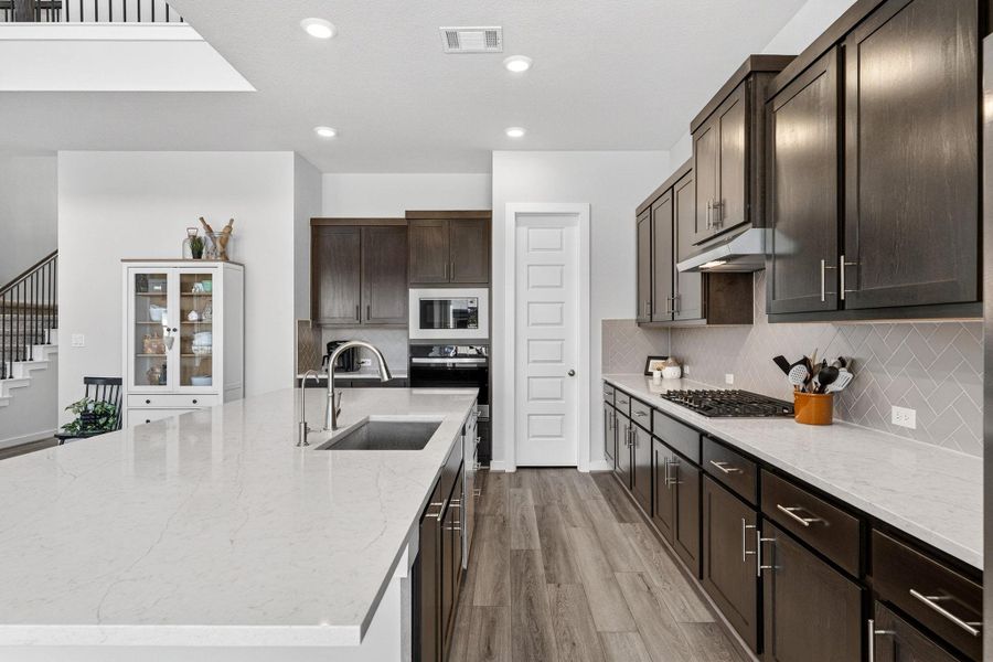 Another view of the beautiful kitchen.