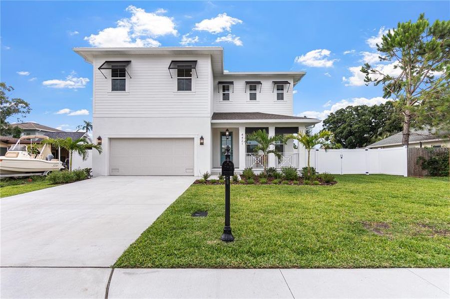 Front exterior of a new home in , Tampa, FL, highlighting curb appeal (Image 29). Front exterior of a new home in , Tampa, FL, highlighting curb appeal (Image 29).