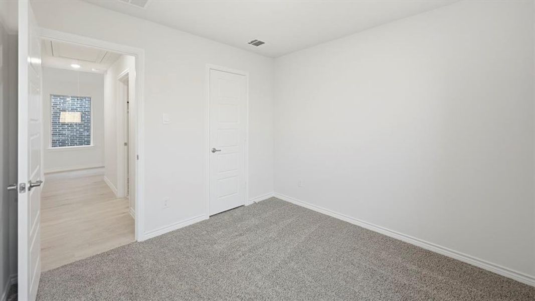 Spacious, unfurnished interior of a new home in Winchester Crossing, Princeton (Image 24).