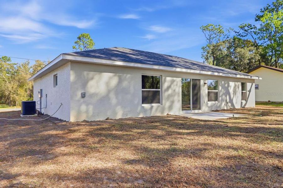 Exterior details and patio area of a home in , Citrus Springs (Image 25).