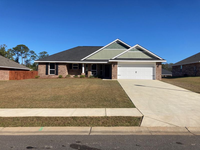 Representative exterior photo of a completed home built from the 1540 by Adams Homes in Okeechobee, Okeechobee, FL (Image 16).