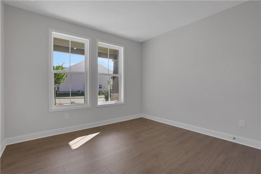 Spacious, unfurnished interior of a new home in The Paddocks at Doc Hughes, Buford (Image 31).