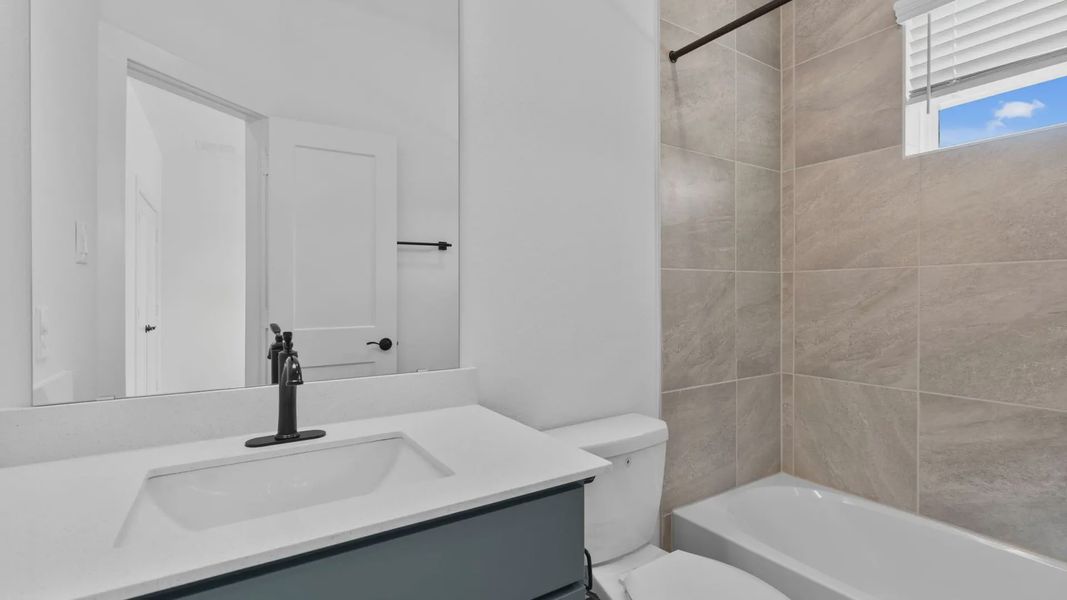 Furnished interior view inside a new home in Evergreen 60s, Conroe (Image 16).