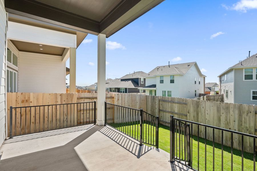 Exterior details and patio area of a home in Lariat, Liberty Hill (Image 3).