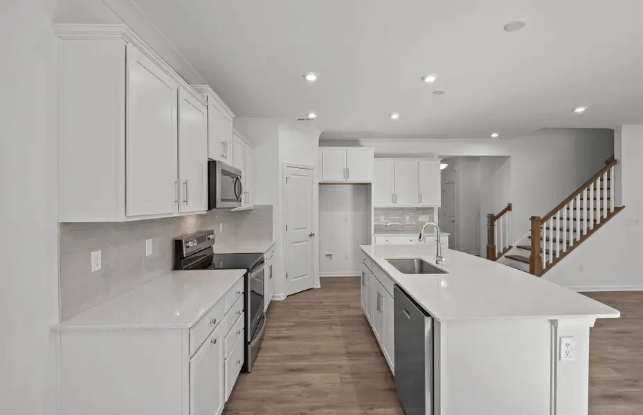 Furnished interior view inside a new home in Parkside Crossing, Charlotte (Image 6). Furnished interior view inside a new home in Parkside Crossing, Charlotte (Image 6).