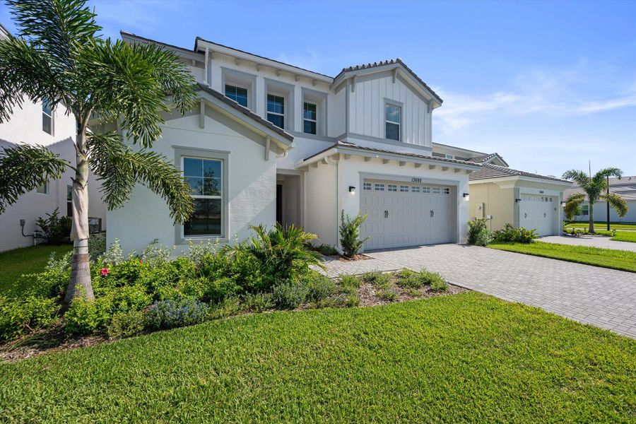 Front exterior of a new home in , Westlake, FL, highlighting curb appeal (Image 29). Front exterior of a new home in , Westlake, FL, highlighting curb appeal (Image 29).