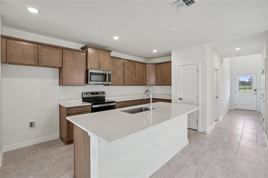 Furnished interior view inside a new home in Grasslands West, Lakeland (Image 12).