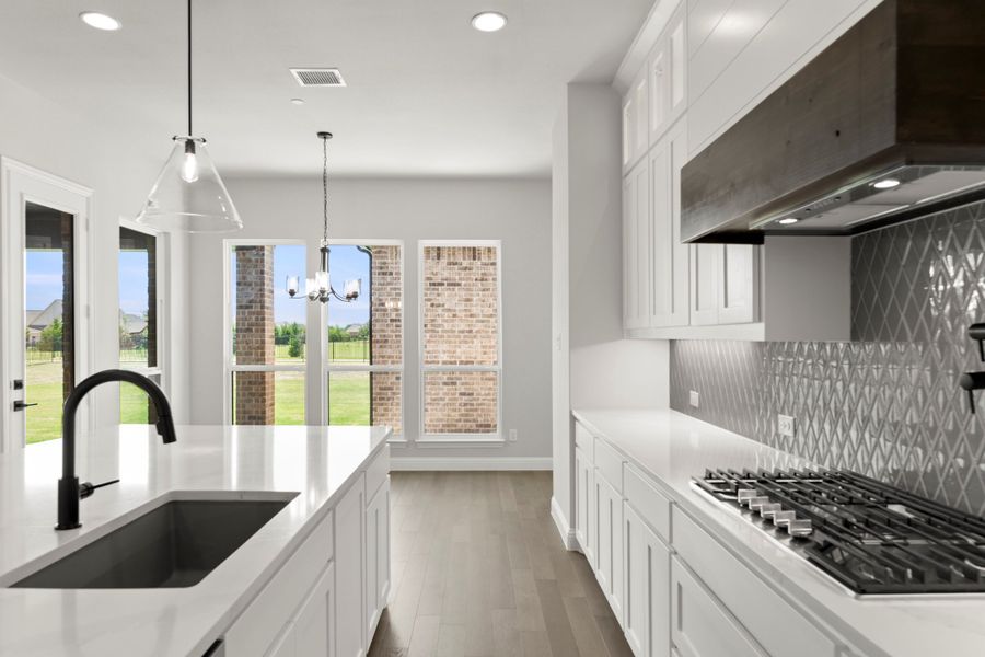 Representative furnished interior of a home built from the Derby by Windsor Homes in Ridge Pointe Estates, McLendon-Chisholm (Image 11).