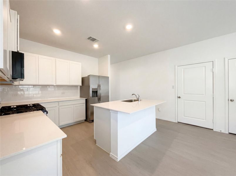 Furnished interior view inside a new home in The Colony, Bastrop (Image 5).