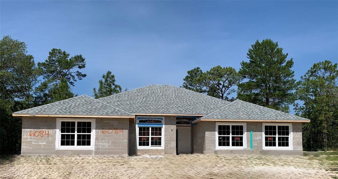 Front exterior of a new home in Pine Ridge, Beverly Hills, FL, highlighting curb appeal (Image 5).