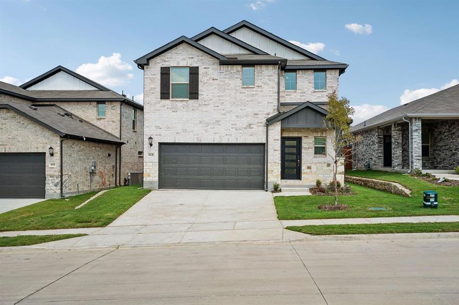 Front exterior of a new home in Simpson Crossing - Spring Series, McKinney, TX, highlighting curb appeal (Image 2). Front exterior of a new home in Simpson Crossing - Spring Series, McKinney, TX, highlighting curb appeal (Image 2).