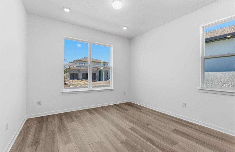 Spacious, unfurnished interior of a new home in Vida's Way, Wesley Chapel (Image 21).