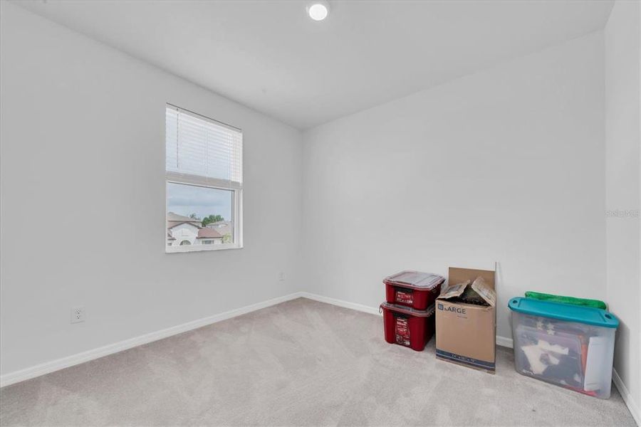 Spacious, unfurnished interior of a new home in Hilltop Point, Dade City (Image 21).