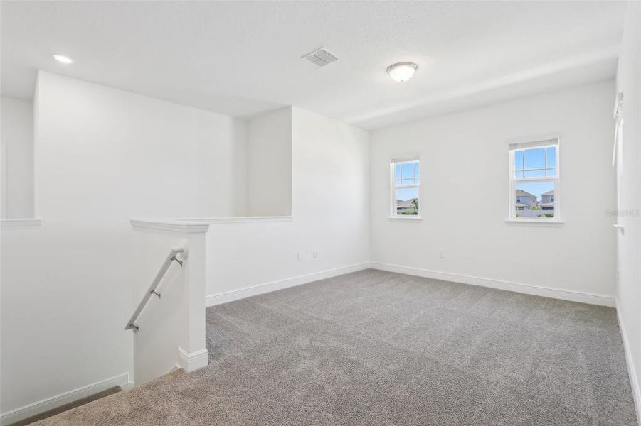 Spacious, unfurnished interior of a new home in Cyrene at Minneola - Villas, Montverde (Image 26).