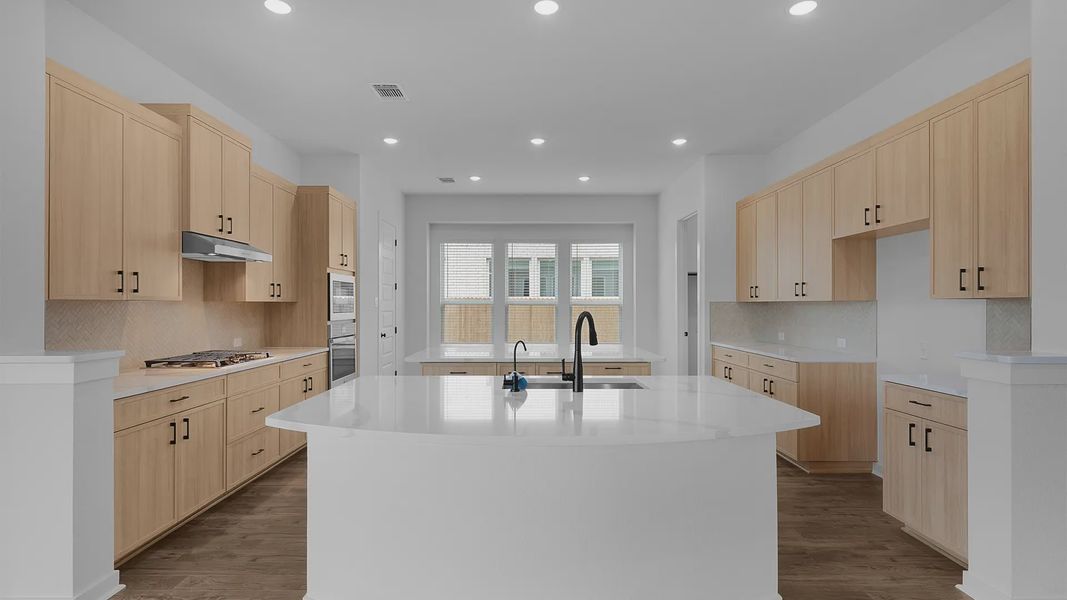 Representative furnished interior of a home built from the Acadia by Chesmar Homes in Crescent Bluff, Georgetown (Image 6).