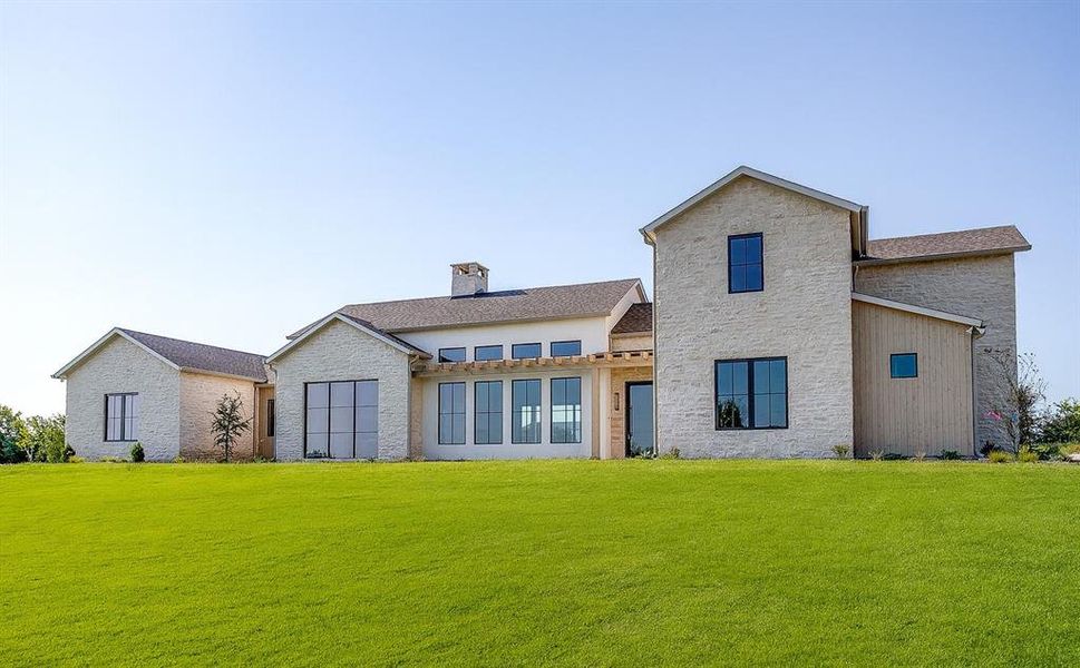 Front exterior of a new home in , Aledo, TX, highlighting curb appeal (Image 2). Front exterior of a new home in , Aledo, TX, highlighting curb appeal (Image 2).