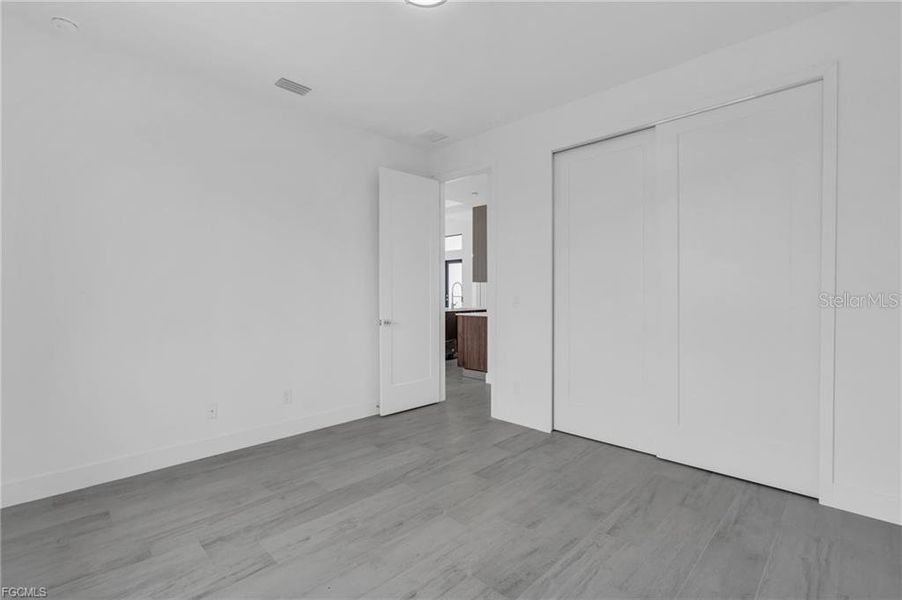 Spacious, unfurnished interior of a new home in , Port Charlotte (Image 32).