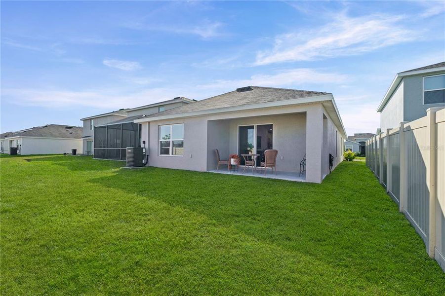 Exterior details and patio area of a home in Silverstone North, Palmetto (Image 21).