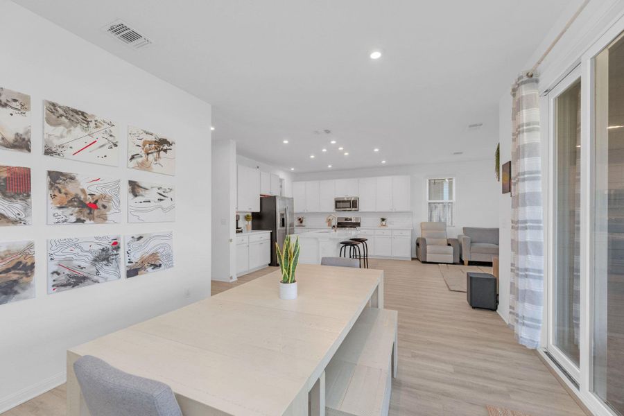 Furnished interior view inside a new home in Seasons at Carillon, Manor (Image 16).