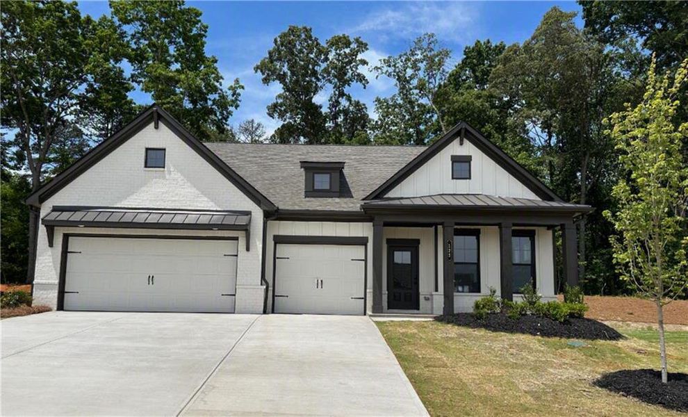 Front exterior of a new home in Rosewood Lake Preserve, Hoschton, GA, highlighting curb appeal (Image 1). Front exterior of a new home in Rosewood Lake Preserve, Hoschton, GA, highlighting curb appeal (Image 1).