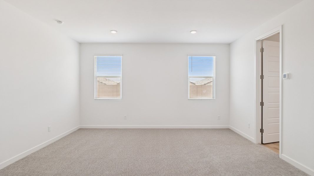 Spacious, unfurnished interior of a new home in Zanjero Pass, Waddell (Image 34).