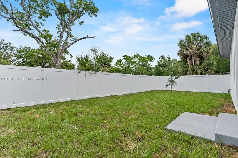 Exterior details and patio area of a home in , Tampa (Image 26).