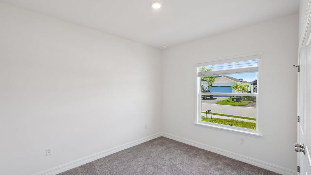 Spacious, unfurnished interior of a new home in Heritage Station, Punta Gorda (Image 39).