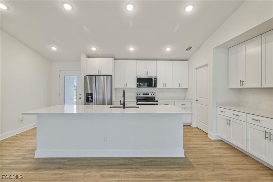 Furnished interior view inside a new home in Cape Coral, Cape Coral (Image 9).