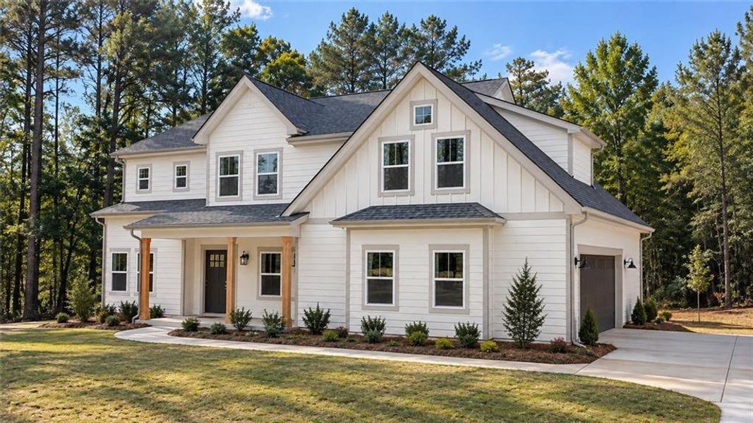 Front exterior of a new home in , Winston, GA, highlighting curb appeal (Image 1). Front exterior of a new home in , Winston, GA, highlighting curb appeal (Image 1).