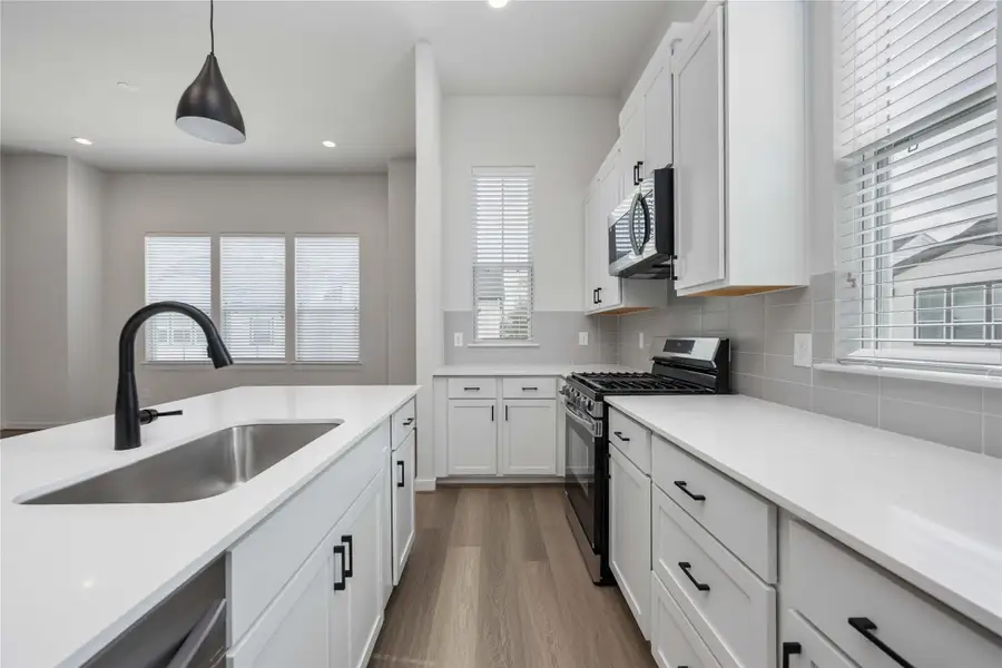 Furnished interior view inside a new home in Fulton Crossing, Houston (Image 9). Furnished interior view inside a new home in Fulton Crossing, Houston (Image 9).
