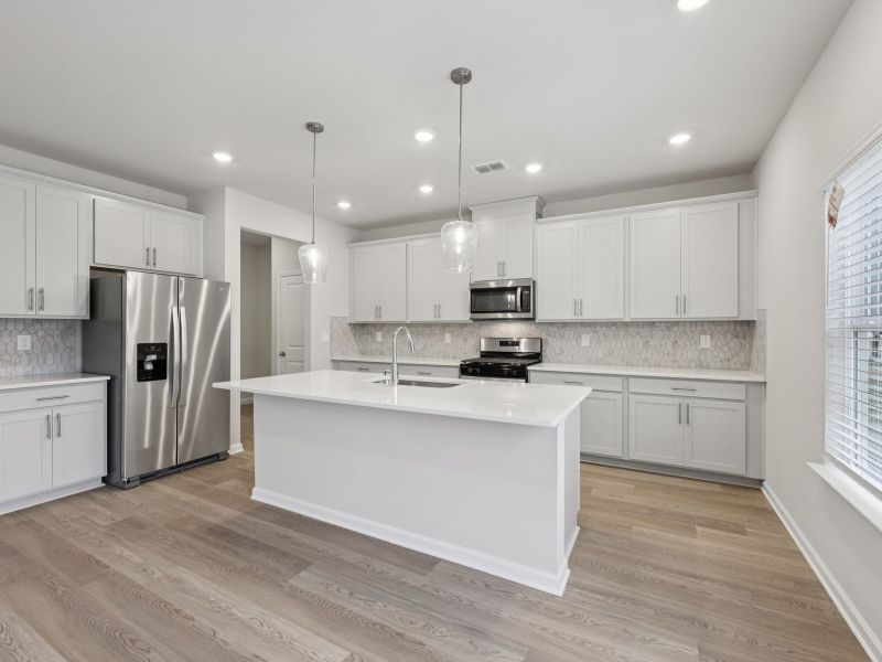 Furnished interior view inside a new home in Parkside at Grayson, Grayson (Image 5).