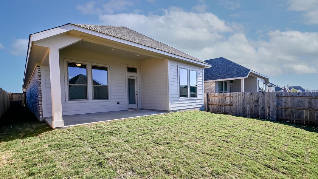 Exterior details and patio area of a home in Crosswinds 40', Kyle (Image 3).