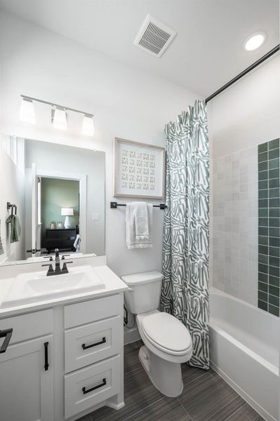 Furnished interior view inside a new home in Bridgeland, Cypress (Image 29).