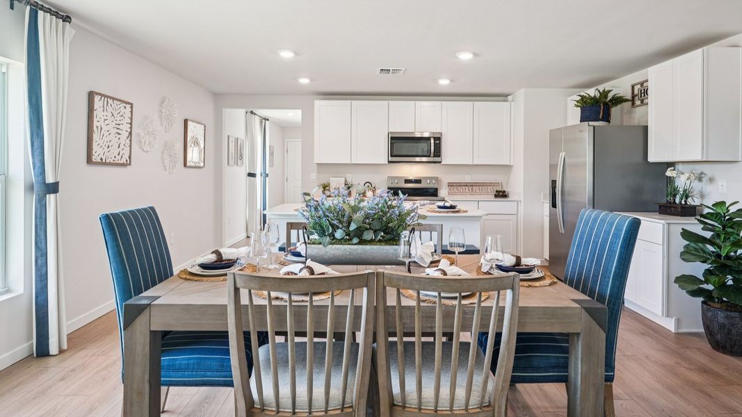 Furnished interior view inside a new home in Coral Bay - Express & Tradition, North Fort Myers (Image 11).