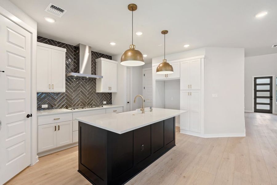 Furnished interior view inside a new home in Terrace Collection at Lariat, Liberty Hill (Image 12). Furnished interior view inside a new home in Terrace Collection at Lariat, Liberty Hill (Image 12).