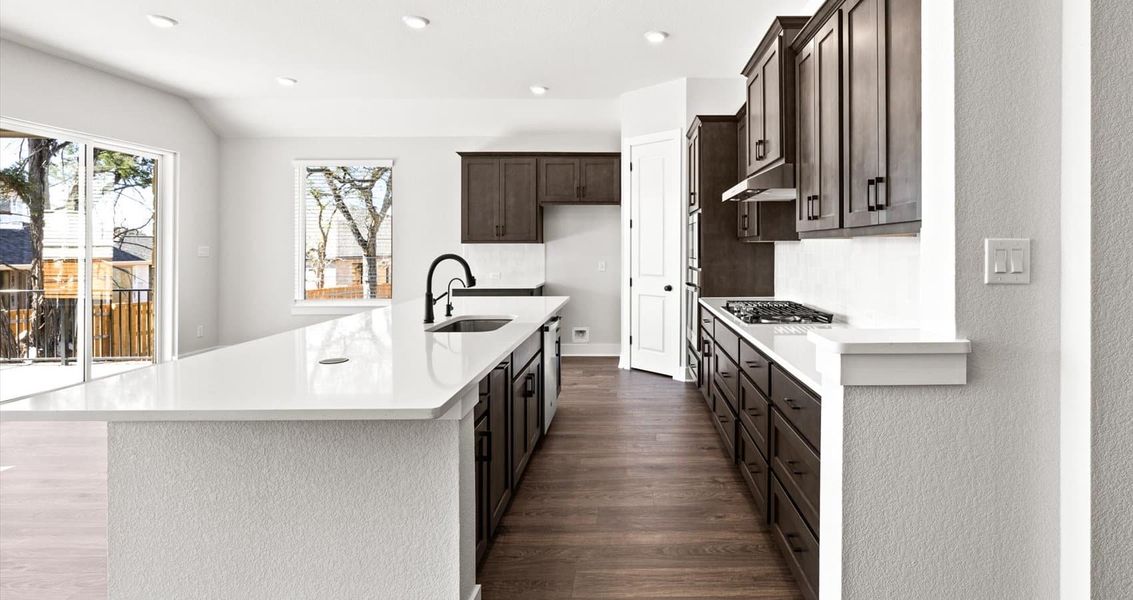 Furnished interior view inside a new home in 6 Creeks, Kyle (Image 7).