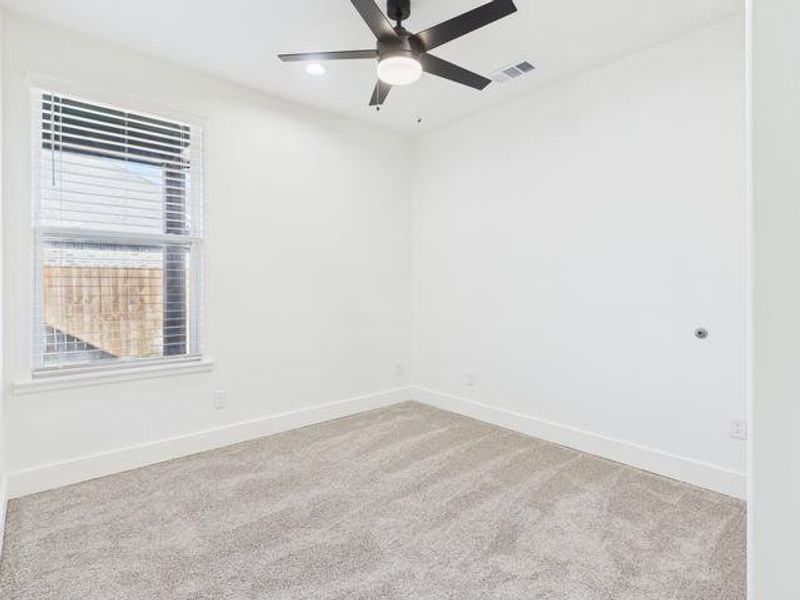Spare room with light colored carpet, a ceiling fan, and recessed lighting Spare room with light colored carpet, a ceiling fan, and recessed lighting