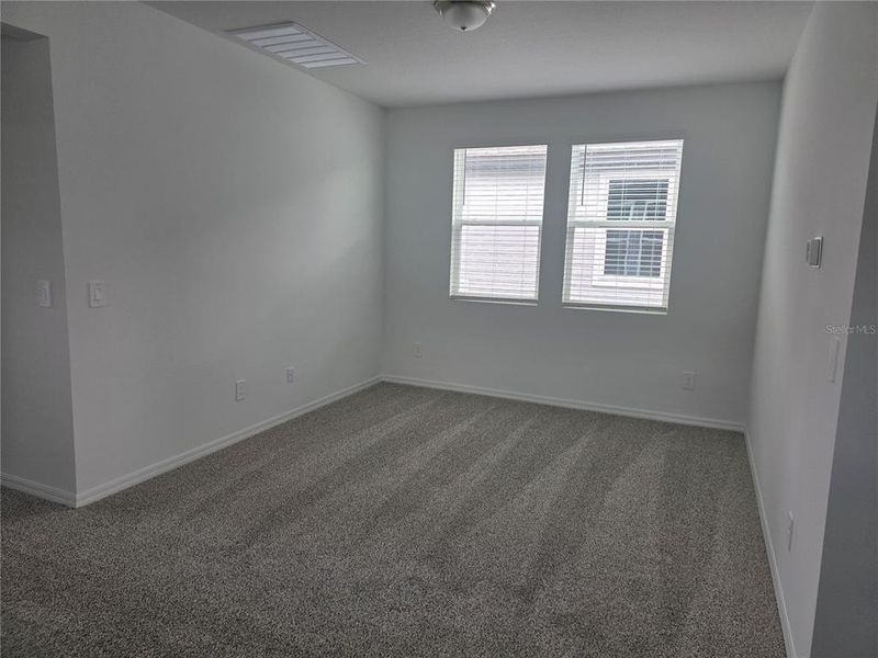 Spacious, unfurnished interior of a new home in The Meadow at Crossprairie Bungalows, St. Cloud (Image 21).