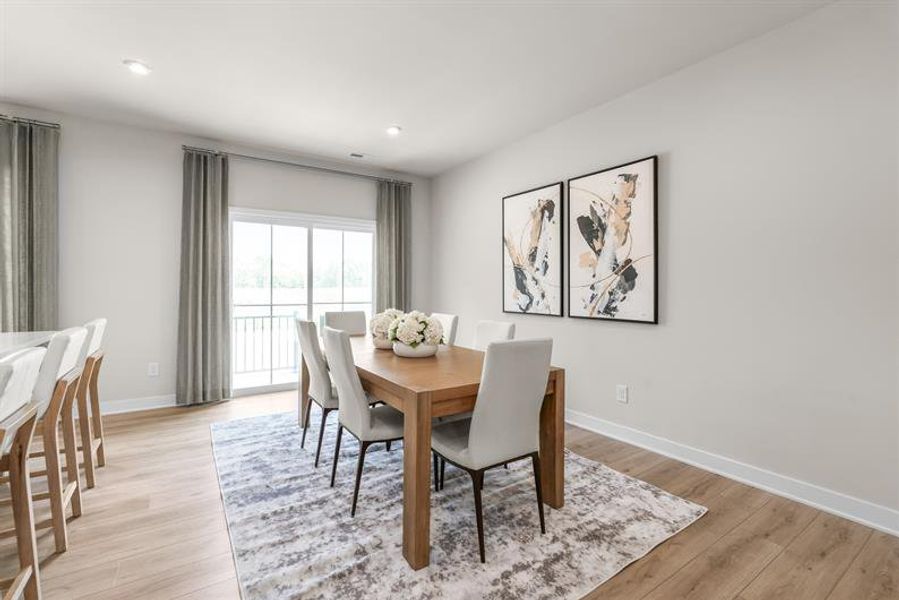 Representative furnished interior of a home built from the Mendelssohn by Ryan Homes in Stowe Branch Townhomes, Charlotte (Image 4).