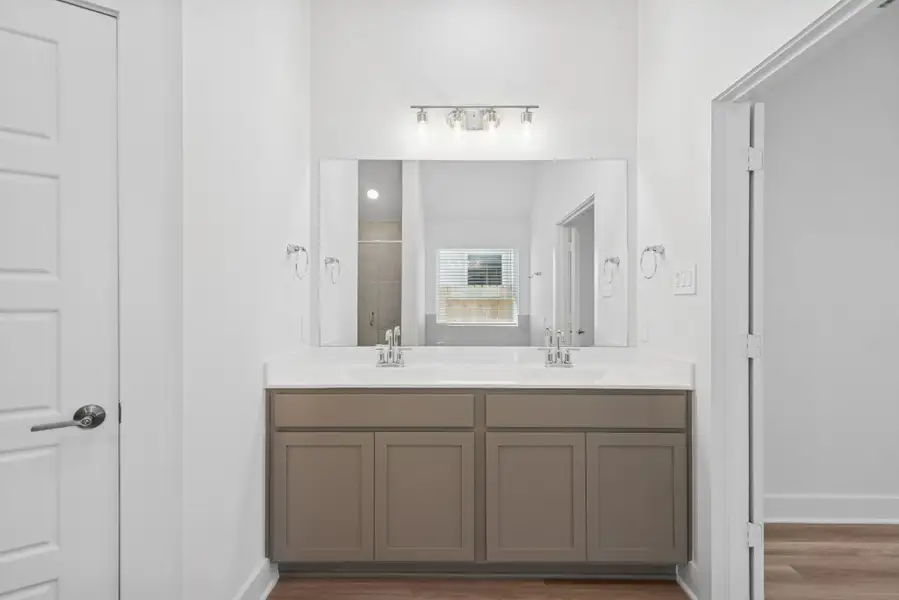 Furnished interior view inside a new home in Lone Star Landing, Montgomery (Image 6).