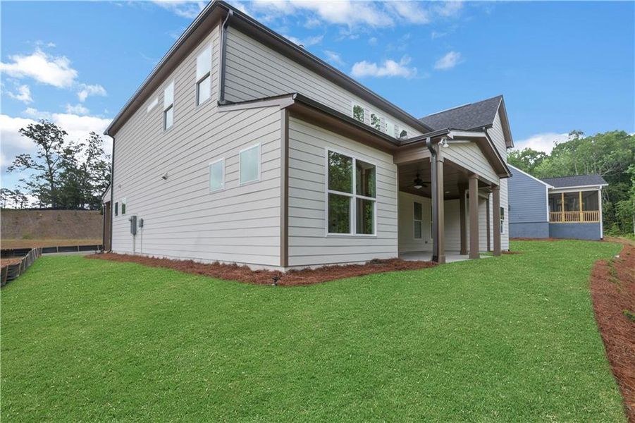 Exterior details and patio area of a home in Arbor West, Dawsonville (Image 31).