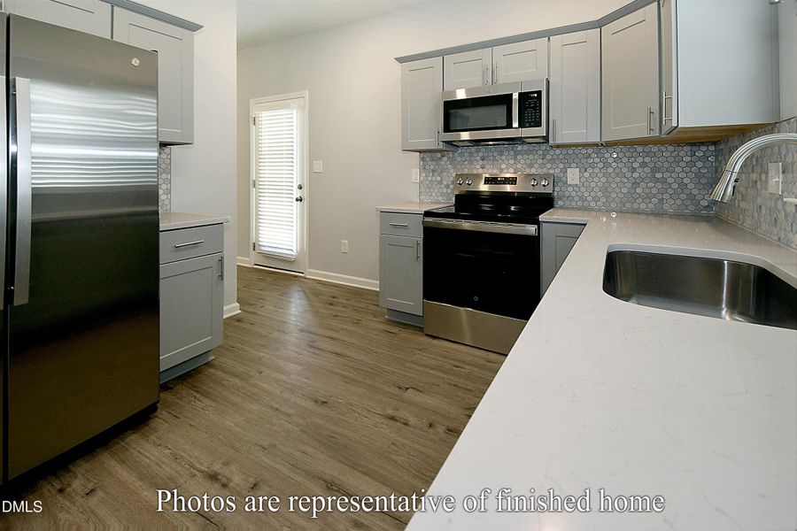 Kitchen from garage door Kitchen from garage door