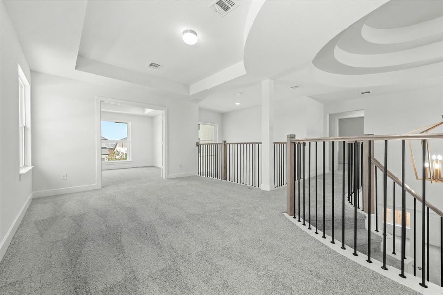 Spacious, unfurnished interior of a new home in Sunterra, Katy (Image 11).