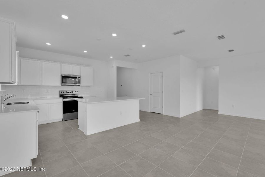 Furnished interior view inside a new home in Hyland Trail, Green Cove Springs (Image 7).