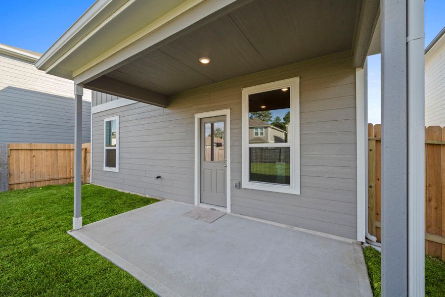 Exterior details and patio area of a home in Peppervine, Porter (Image 3). Exterior details and patio area of a home in Peppervine, Porter (Image 3).