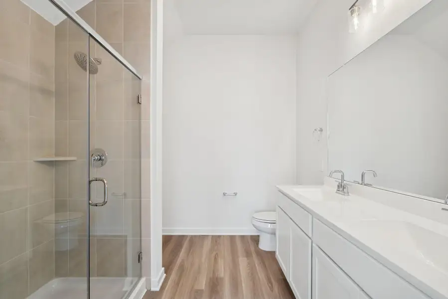 Furnished interior view inside a new home in Pinewood at Grand Texas, New Caney (Image 9).