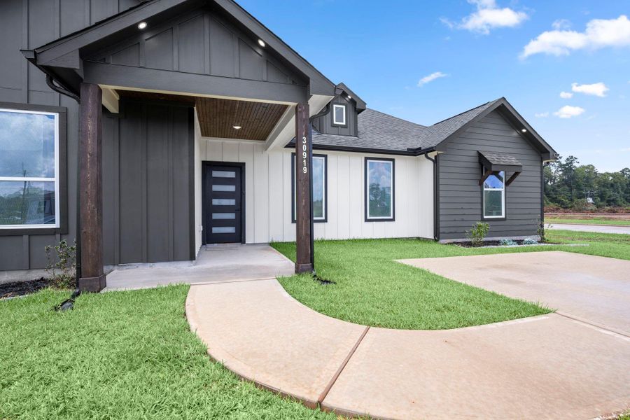 Exterior details and patio area of a home in , Huffman (Image 3). Exterior details and patio area of a home in , Huffman (Image 3).
