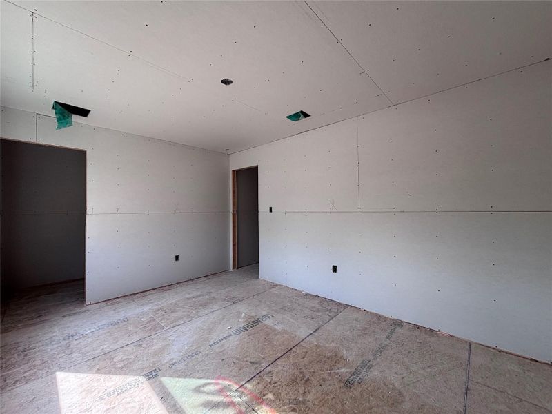 In-progress construction of a new home in The Colony, Bastrop, TX (Image 18).